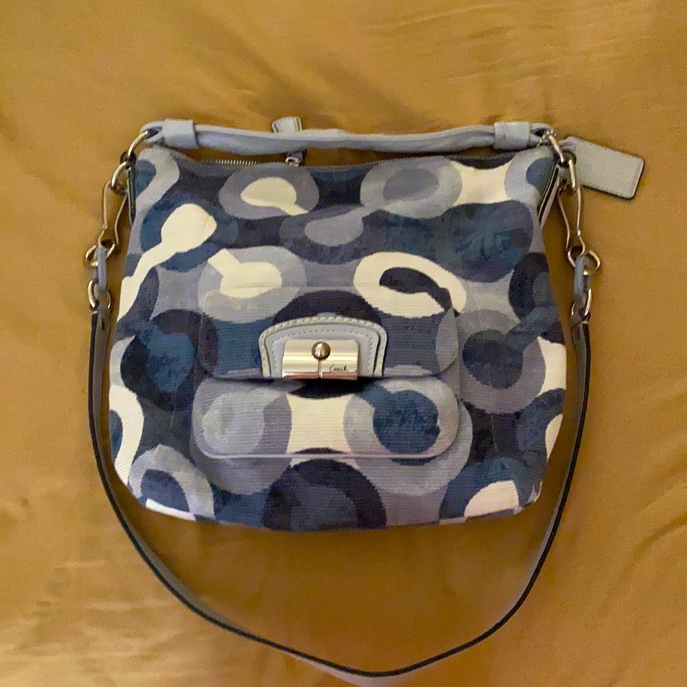 New without tag Coach crossbody bag.  Goes great with blue jeans.
